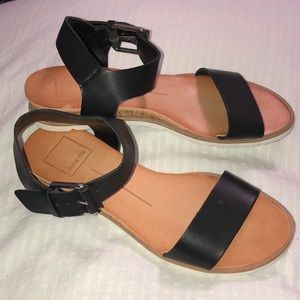 EUC Dolce Vita sandals size 6. Black faux leather with white rubber sole.